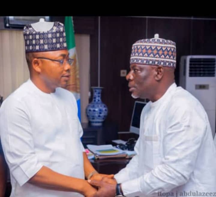 Kogi State Governor, Alhaji Ahmed Usman Ododo and Kogi State President of the Nigeria Union of Local Government Employees (NULGE), Comrade Mohammed Sanisu Inyanya