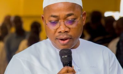 NFSC Boss center flanked by the awardee and friends